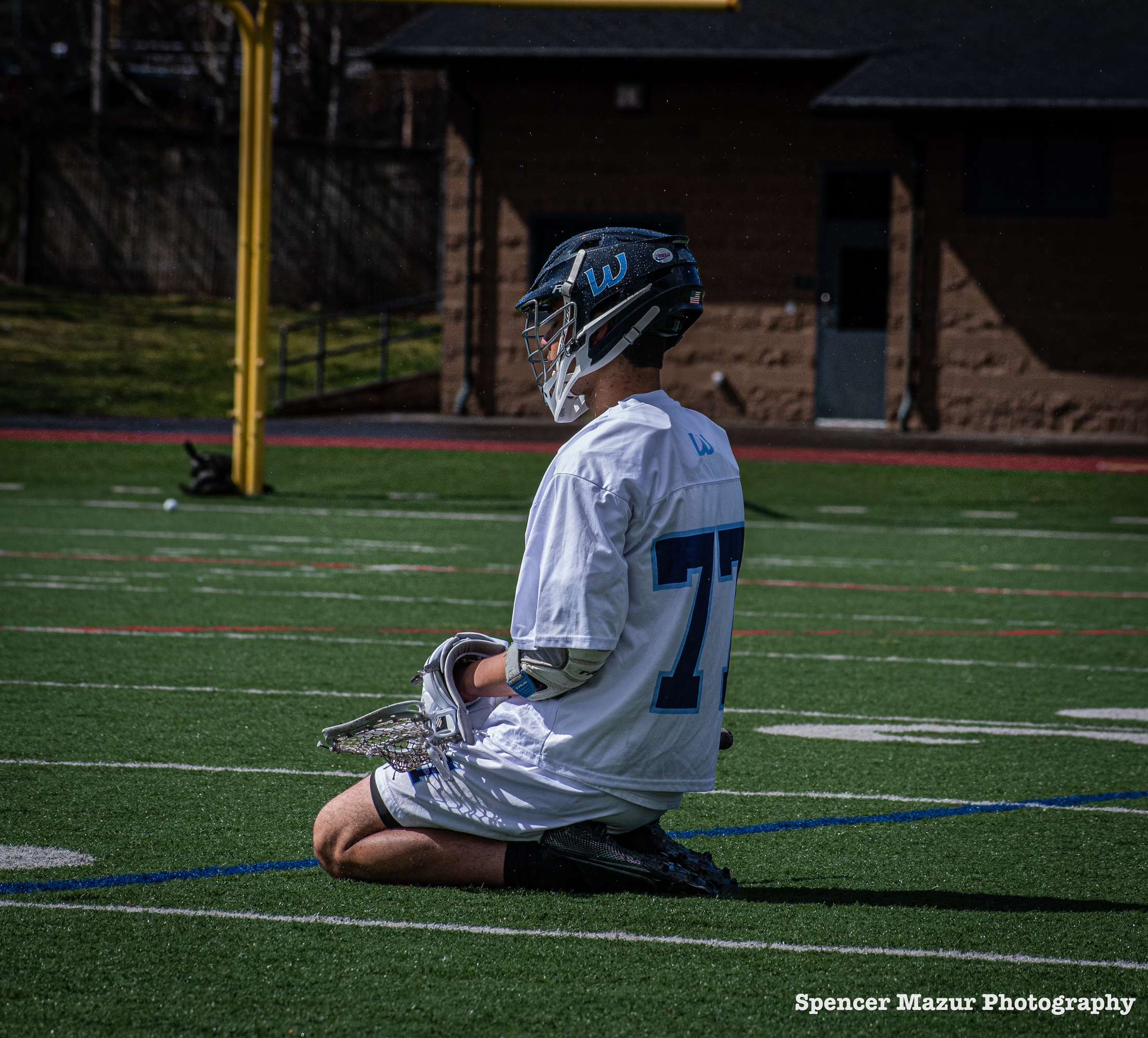 Michael playing lacrosse